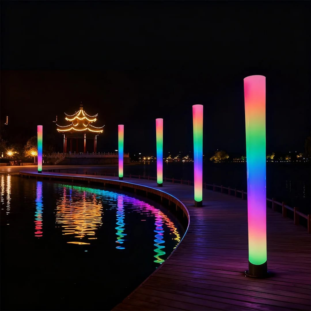 Rainbow light pillars along the night boardwalk.